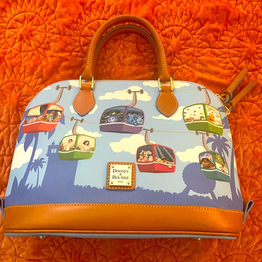 Disney Dooney & Bourke WDW Skyliner satchel with shoulder strap.